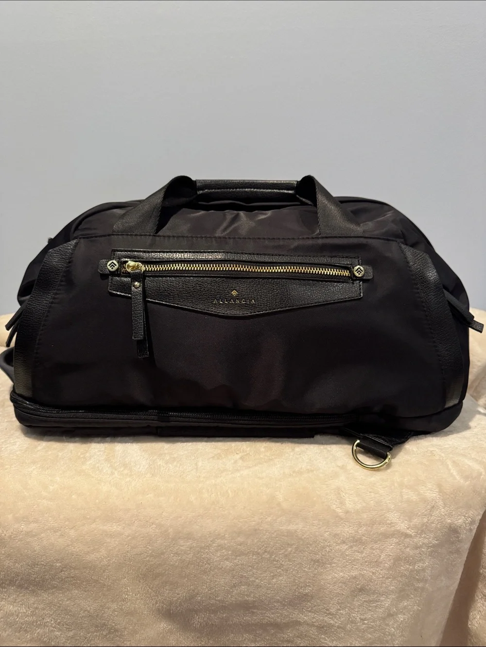 Allancia Peyton black nylon backpack featuring striking gold-tone hardware. NEW